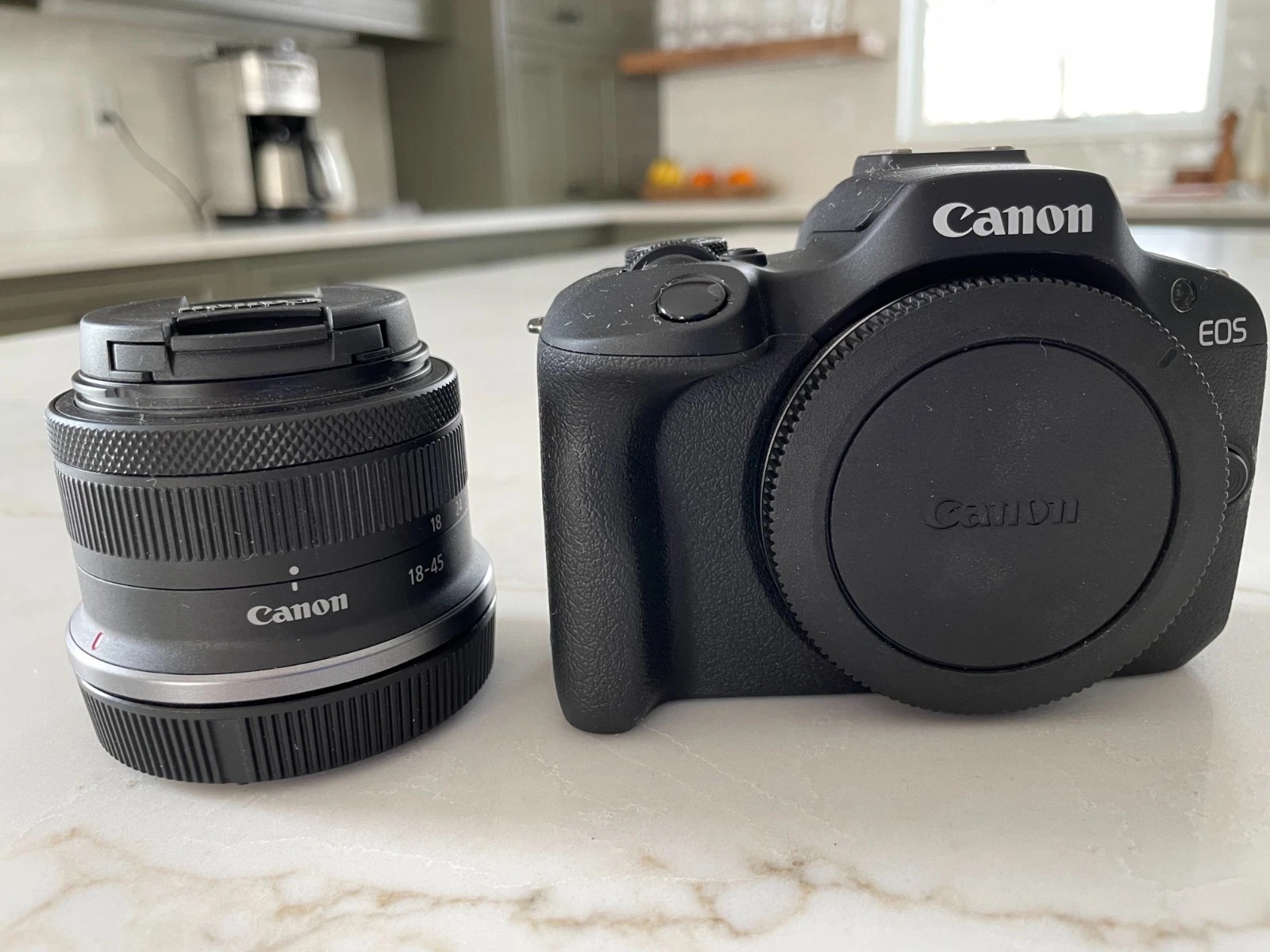 Canon EOS R100 24.2MP Digital Mirrorless Camera with Kit Lens - Image 1